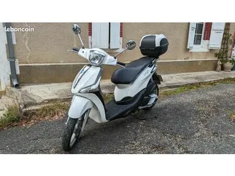 scooter piaggio liberty 125 avec top case