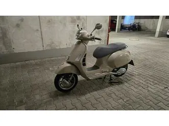 vespa gts 125 beige avvolgente
