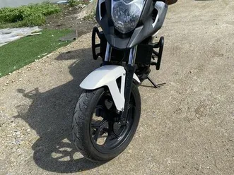 honda nc 700x muito bem estimada e economica. rebordões