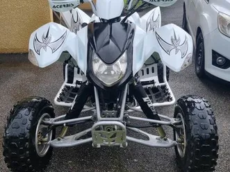 quad triton baja 300
