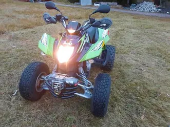 arctic cat dvx 300, kymco maxxer quad