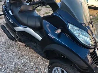 ?a saisir piaggio mp3 400 lt bon état