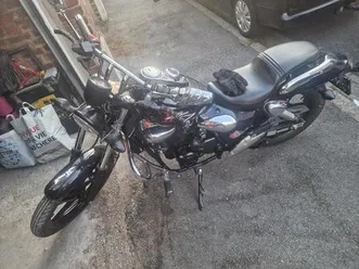 ② moto kimco 125 cc en parfaite état 3000km