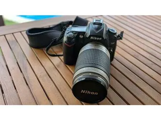 nikon d90 con teleobjetivo y flash