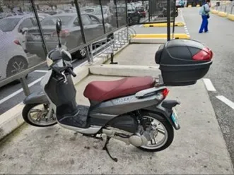 scooter 125 cc tweet