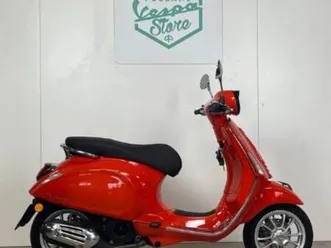 vespa primavera 125 iget orange impulsivo