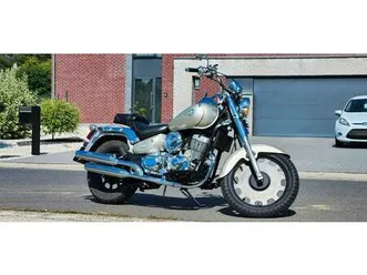 ② daelim daystar 125 cc en parfait état.