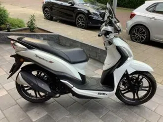 nieuwstaat wide edition sympony st bromscooter geel kenteken — scooters | sym — marktplaats