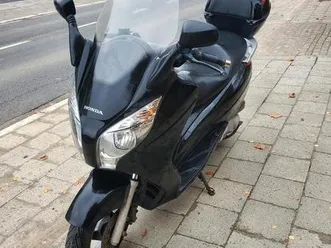 ② honda swing 125 cc