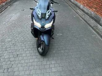 ② sym adx 125 cc indigo mat kleur met tcs en abs 2500km