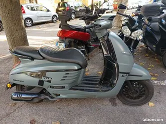 peugeot django shadow 125(encore garantie)+ 2 casque et antivol