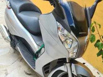 vends scooter 125 swing