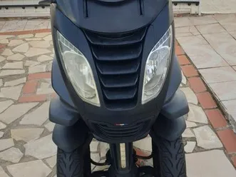 scooters trois roues