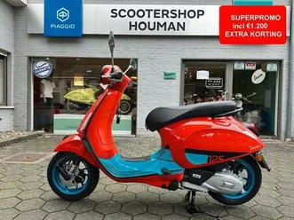② vespa primavera 125 cc color vibe arancio