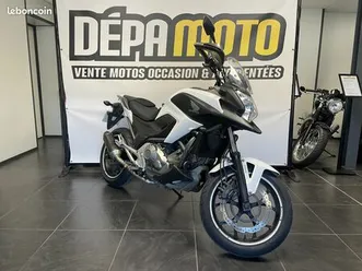 nc 700 x garantie 12 mois