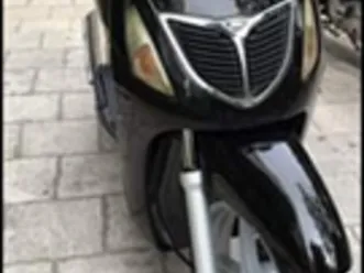 sh 150 con soli 13 mila km iscritto asi