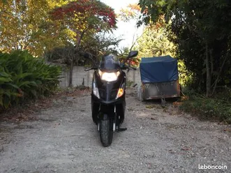 a saisir kymco dink très peu roulé