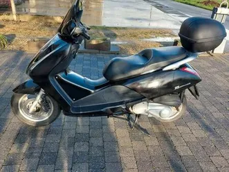 ② honda pantheon 125 cc