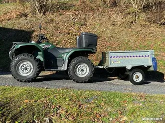 quad yamaha grizzly 450 avec remorque et lame à neige