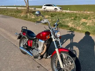 suzuki savage ls 650 rotes cruiser motorrad mit chromdetails