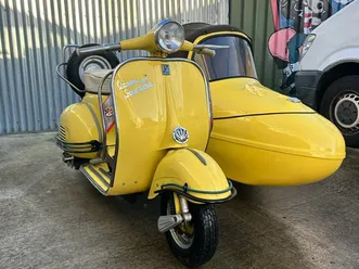 1961 vespa sportique with bambini sidecar