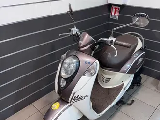 scooter sym mio 100 marron et blanc garanti 3 mois