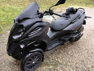 échange maxi scooter 3 roues contre voiture
