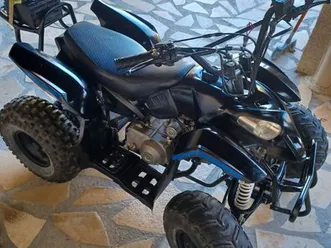quad 125 cc ( tres peut servi)