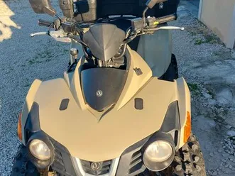 quad sym exellent état 2100e