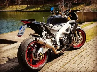 sehr gepflegte und schön umgebaute aprillia tuonov4 an.