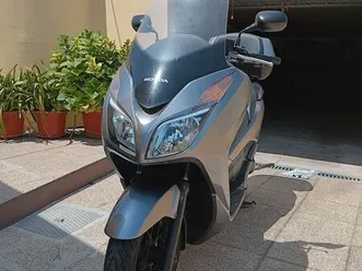 honda forza 300. mira