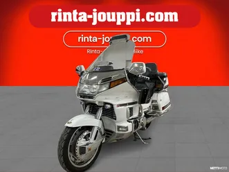 vakionopeudensäädin, sivulaukut, peruutusvaihde, radio