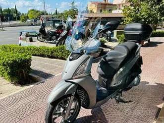 kymco people gt 300 passaggio garanzia tagliando