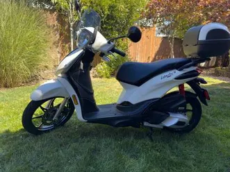 paiggio scooter - brand new condition