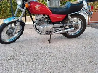 honda 125 cm en excellent état