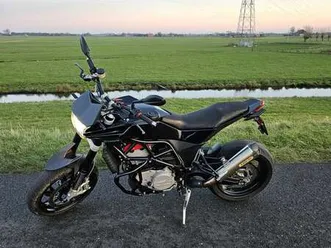 carbon + arrow uitlaat