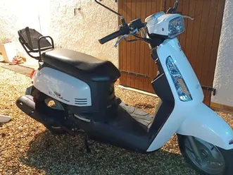 scooter 125 idéal camping car