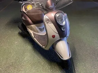 scooter mio 100