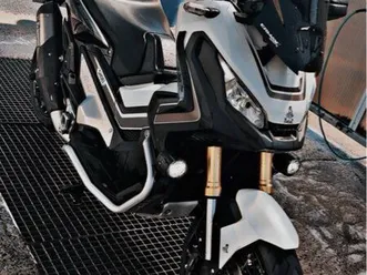 750 xadv contre tmax