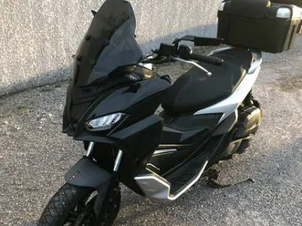 échange 125 aprilia sr gt