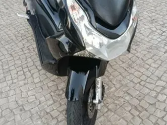 moto pcx usada. moto impecável portimão
