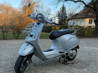 ② vespa primavera 50 touring