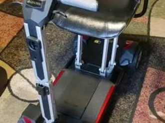 brand new red motorized scooter (buzz around carry on)