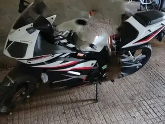 échange 125 daelim roadsport contre barque de pêche