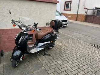 retro roller 125 er