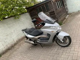 ② kymco xciting 250 4 temps très économique
