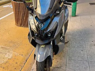 superbe cruysym 125 abs et tcs avec top case garanti 01/2029