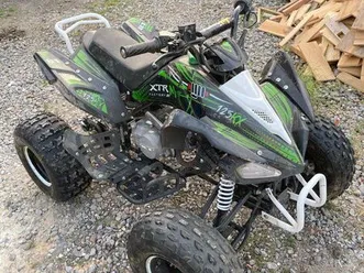 quad 125