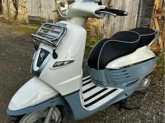 scooter peugeot django 125 injection