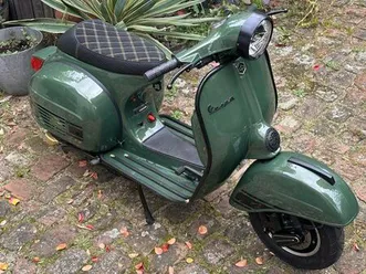 vespa 125 tourismo sport